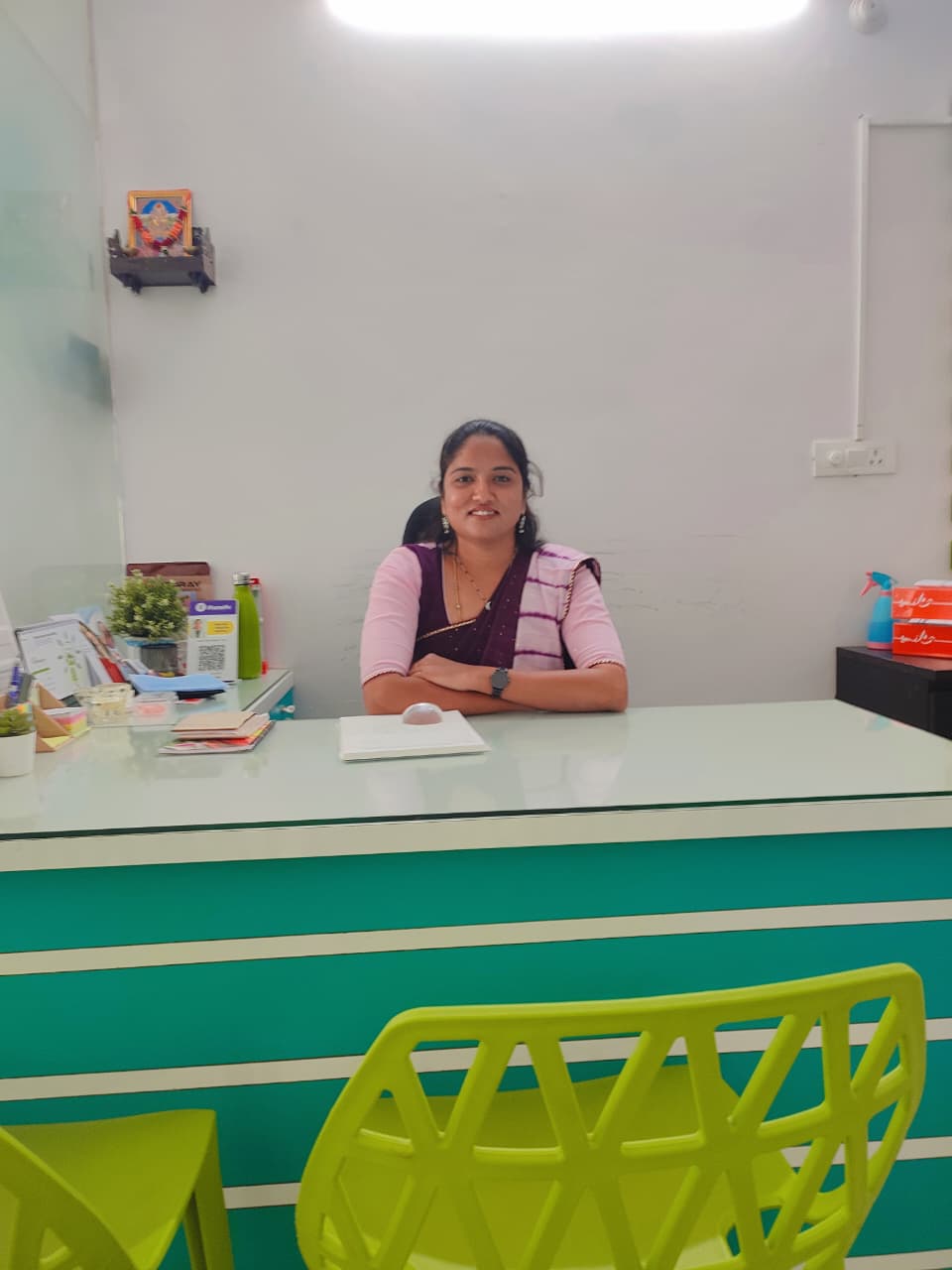 Doctor seated at a Smile Tree Dental Clinic.