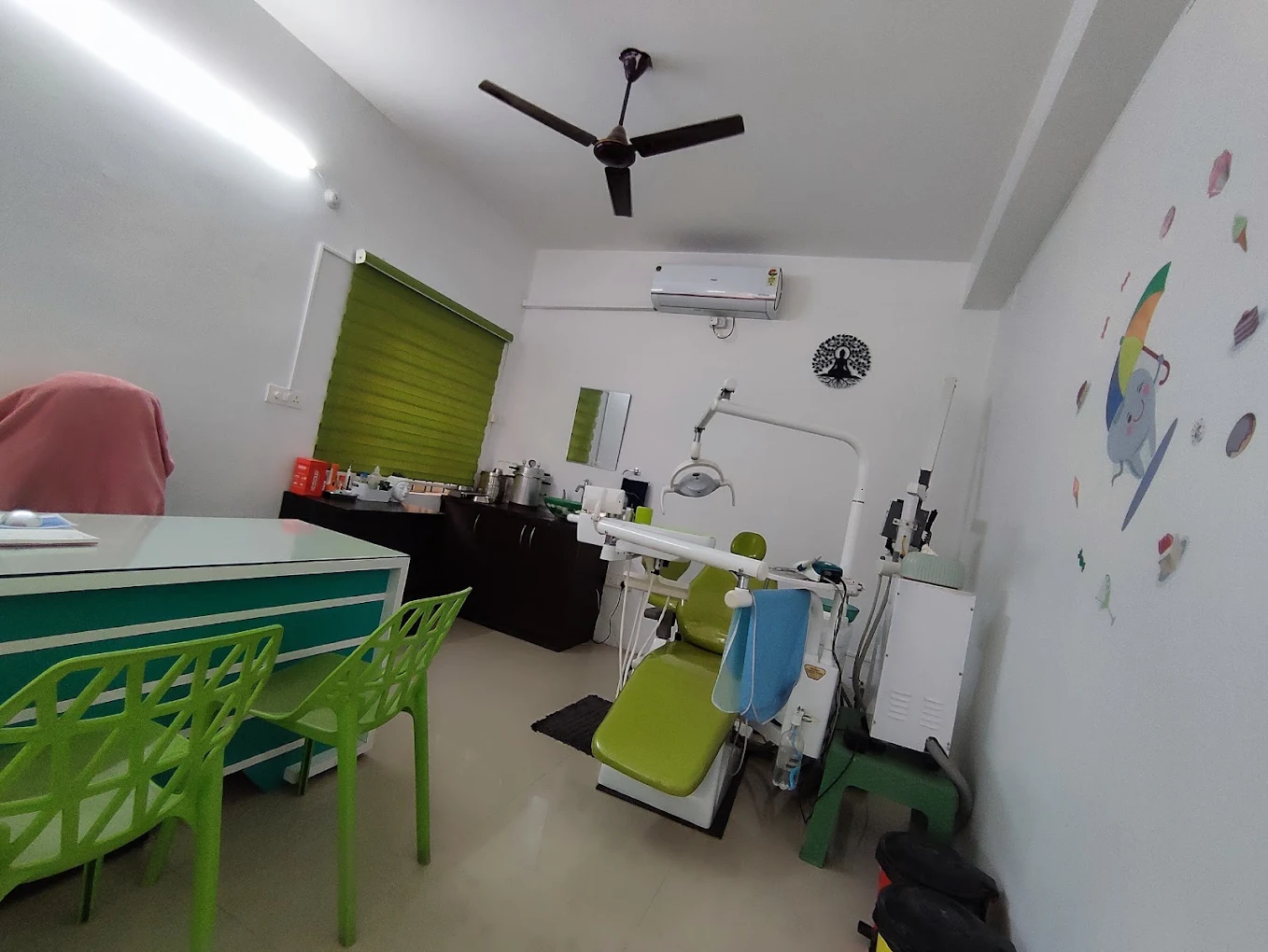 Dental chair and equipment inside a Smile Tree Dental Clinic treatment room.